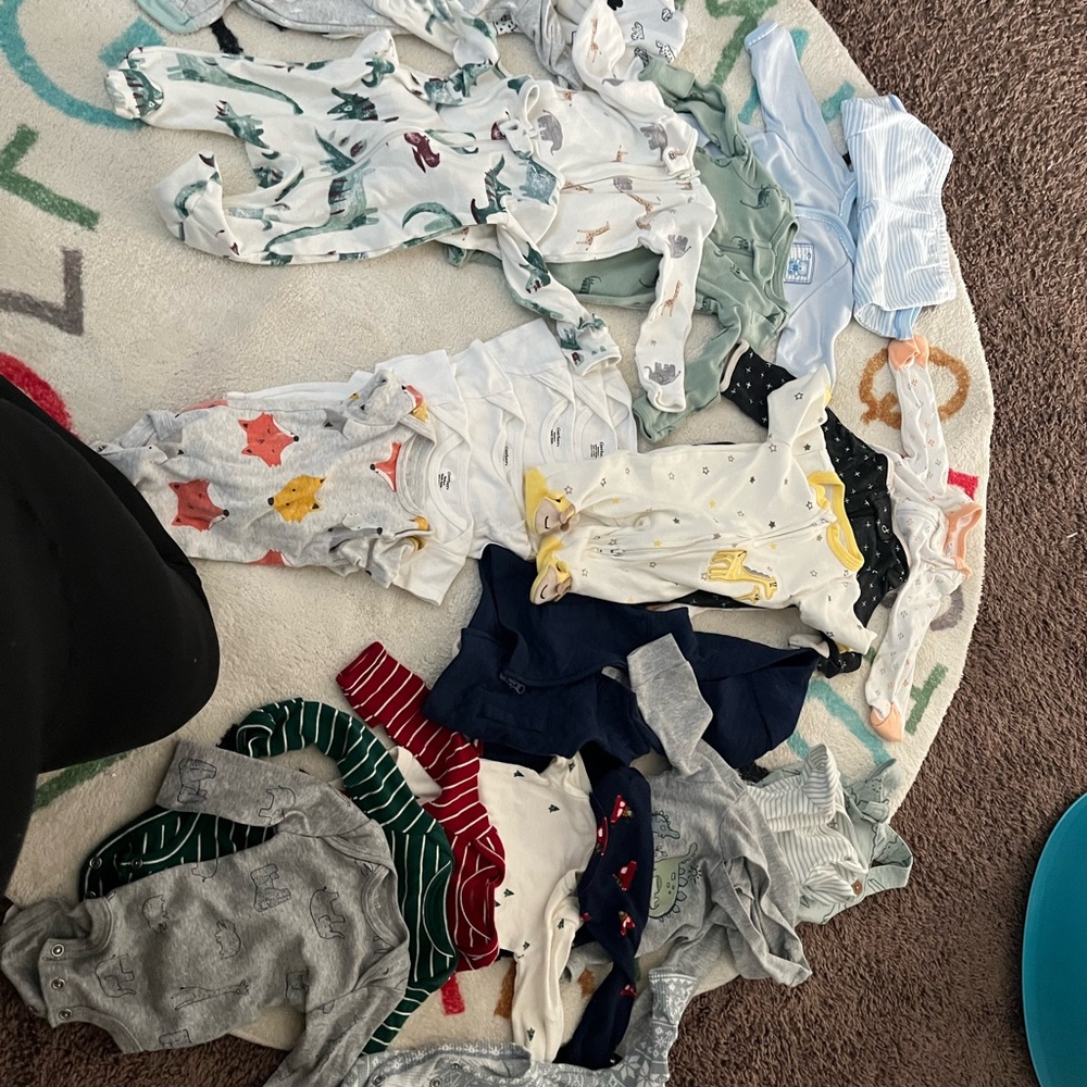 Assorted newborn onesies baby clothes